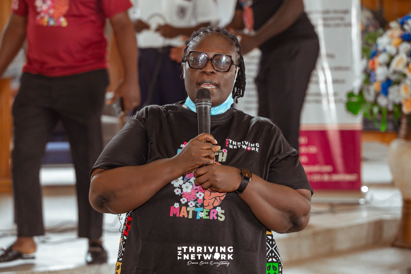 A TTNGH speaker engaging students during a mental health education programme in Tema