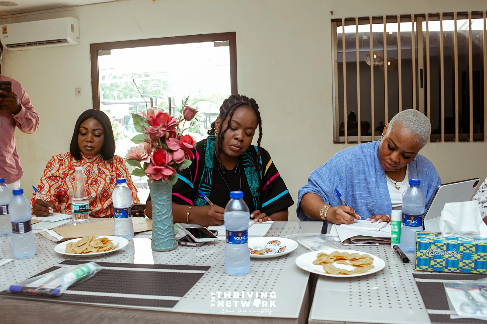 Participants writing together during Vision with Clarity
